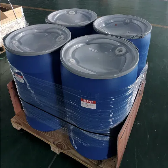 Four blue drums banded and shrink-wrapped onto a wooden pallet