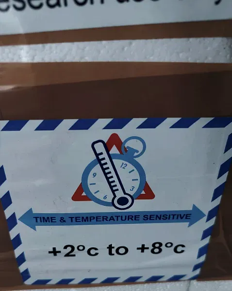 A time and temperature sensitive label on a carton reading plus 2 to plus 8 degrees Celsius